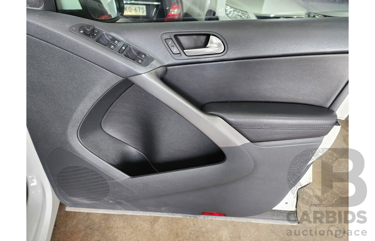 1/2009 Volkswagen Tiguan 103 TDI 5NC MY09 4d Wagon White 2.0L