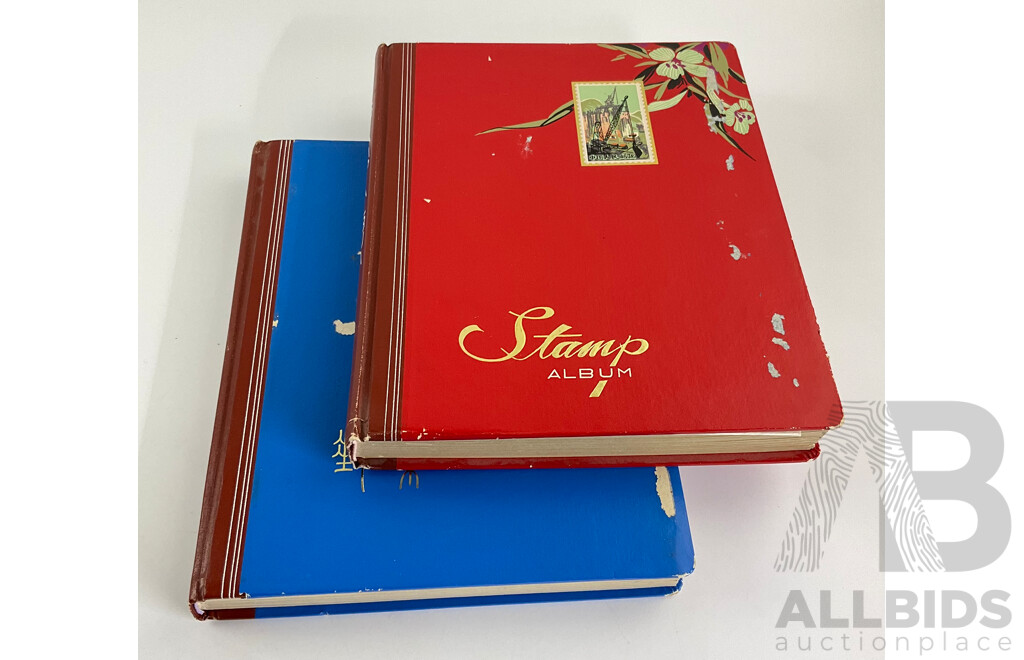 Two Albums of Vintage Stamps Including New Zealand, Dubai, Mongolia, Poland, Cocos Islands, Zimbabwe, Singapore, Canada, Yugoslavia, USA, Netherlands, UK, Fiji, France, PNG, Grenada, Isle of Men