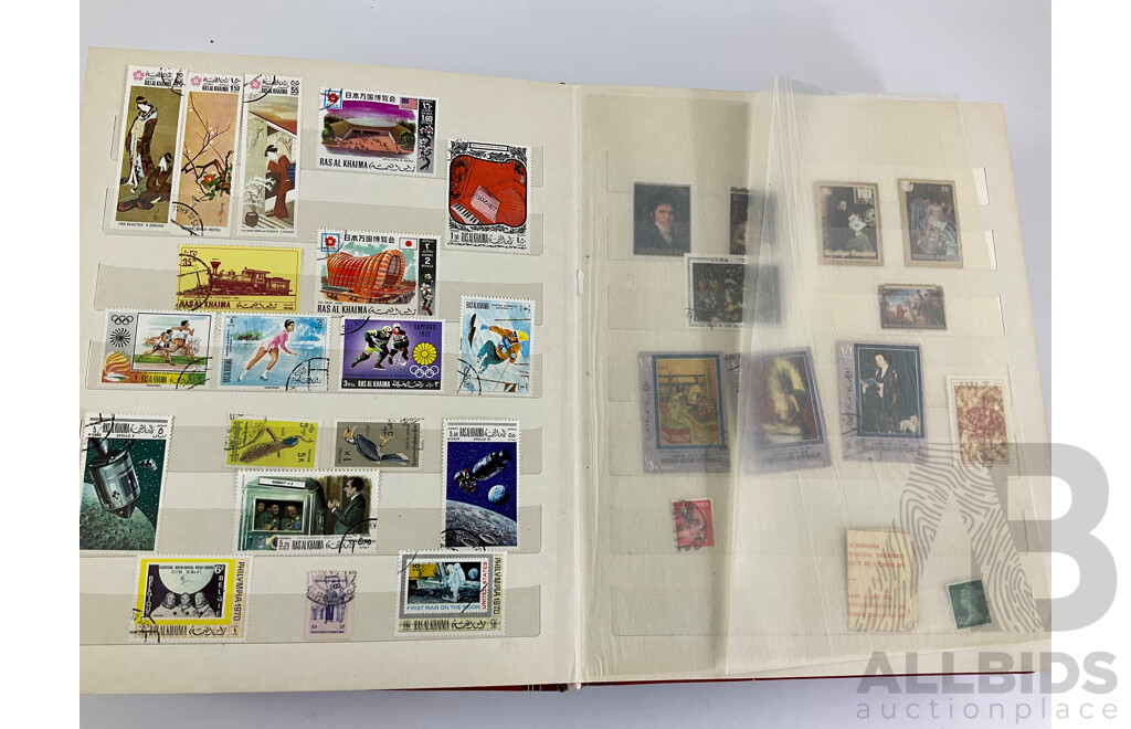 Two Albums of Vintage Stamps Including New Zealand, Dubai, Mongolia, Poland, Cocos Islands, Zimbabwe, Singapore, Canada, Yugoslavia, USA, Netherlands, UK, Fiji, France, PNG, Grenada, Isle of Men