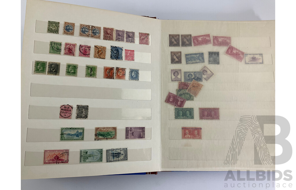 Two Albums of Vintage Stamps Including New Zealand, Dubai, Mongolia, Poland, Cocos Islands, Zimbabwe, Singapore, Canada, Yugoslavia, USA, Netherlands, UK, Fiji, France, PNG, Grenada, Isle of Men