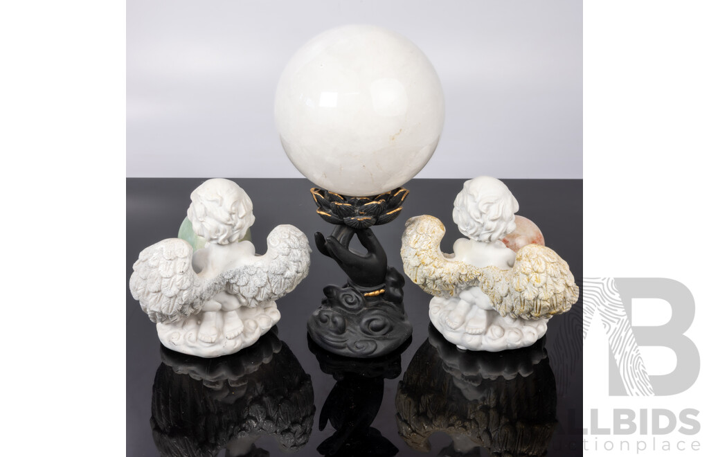 Collection Carved Stone Spheres on Composite Stands Including Pair Angels and Large White Quartz Sphere