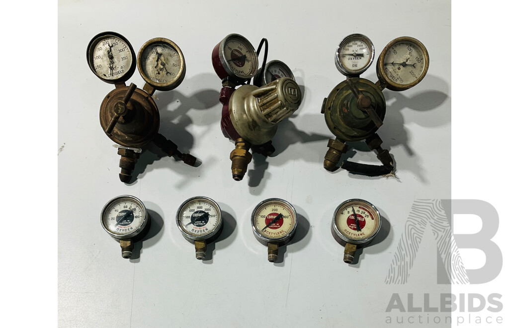 Collection of Mid Century Comweld and CIG Oxygen/Acetylene Gauges and Regulators