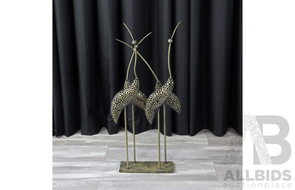 Set of Four Metal Stork Figures