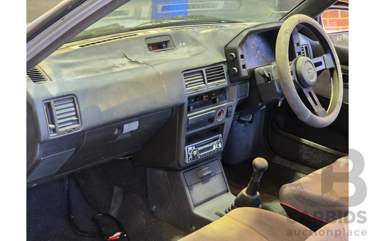 7/1988 Ford Laser TX3 KE 3d Hatchback Grey 1.6L