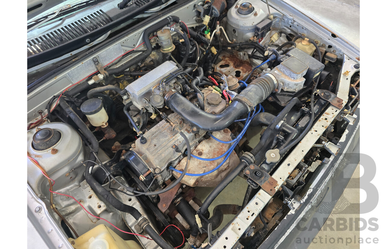 7/1988 Ford Laser TX3 KE 3d Hatchback Grey 1.6L