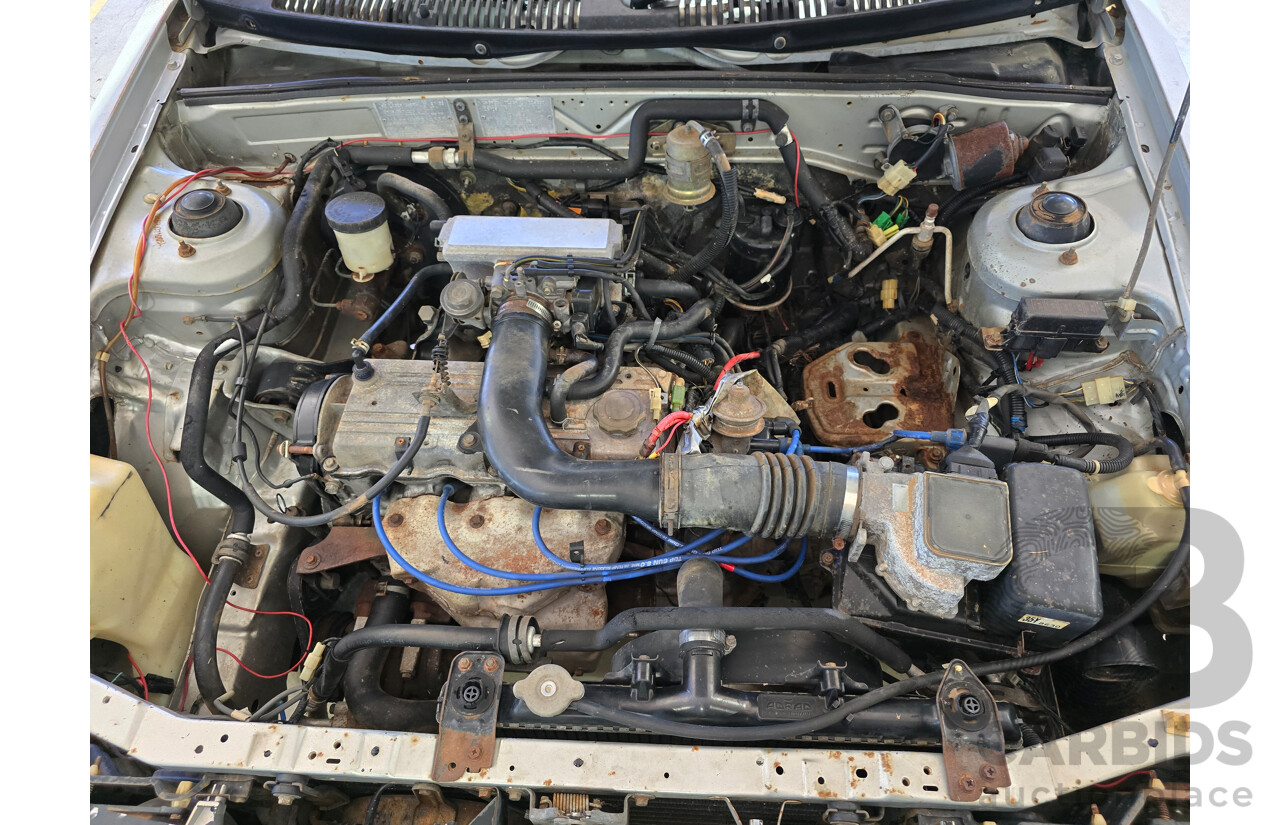 7/1988 Ford Laser TX3 KE 3d Hatchback Grey 1.6L