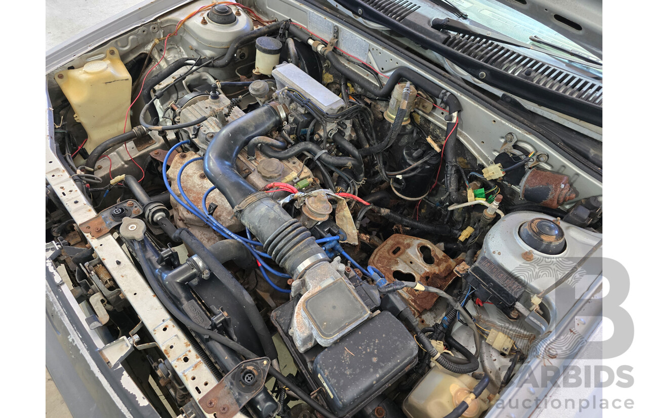 7/1988 Ford Laser TX3 KE 3d Hatchback Grey 1.6L