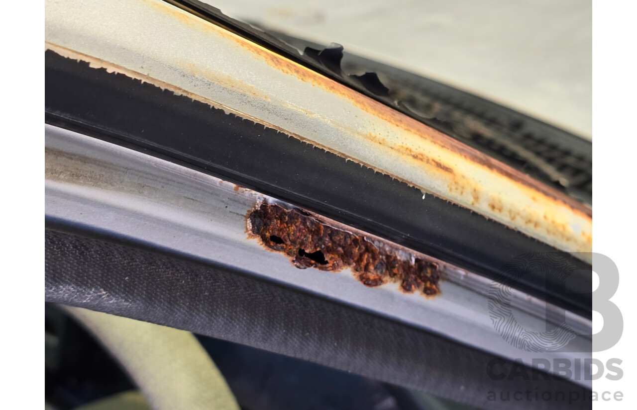 7/1988 Ford Laser TX3 KE 3d Hatchback Grey 1.6L