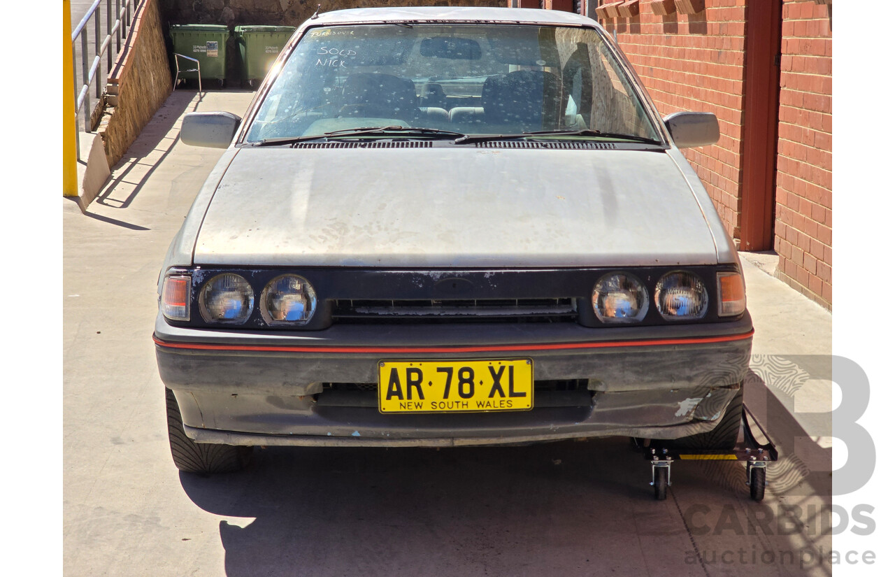 7/1988 Ford Laser TX3 KE 3d Hatchback Grey 1.6L