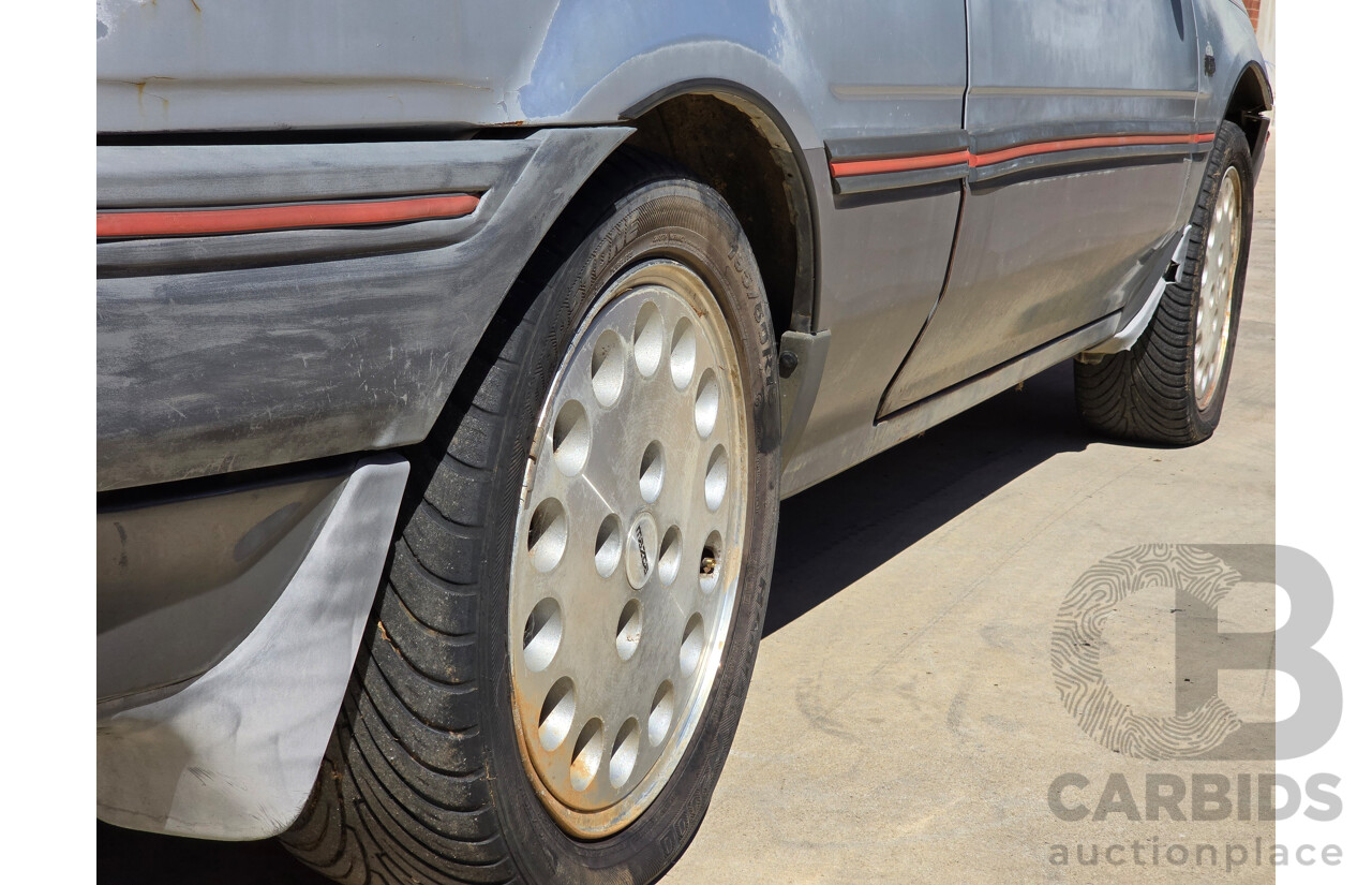 7/1988 Ford Laser TX3 KE 3d Hatchback Grey 1.6L