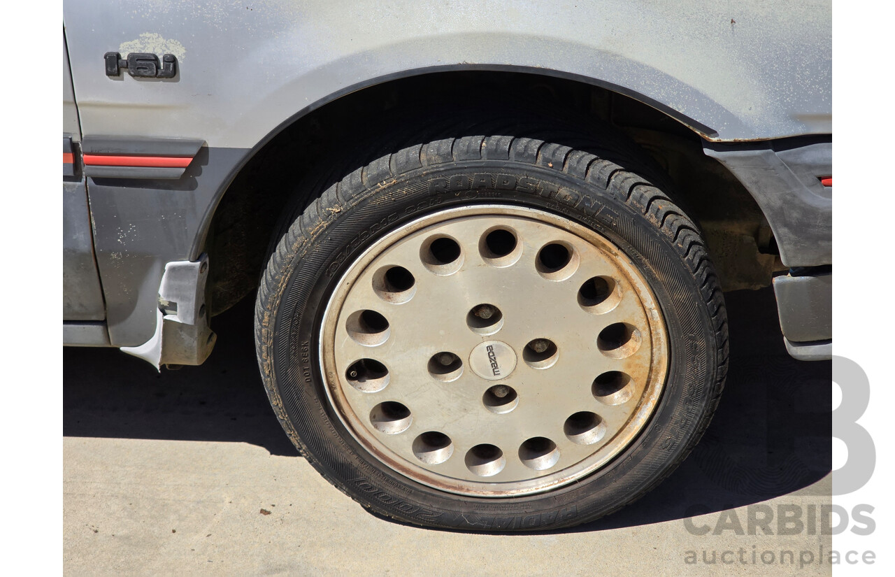 7/1988 Ford Laser TX3 KE 3d Hatchback Grey 1.6L