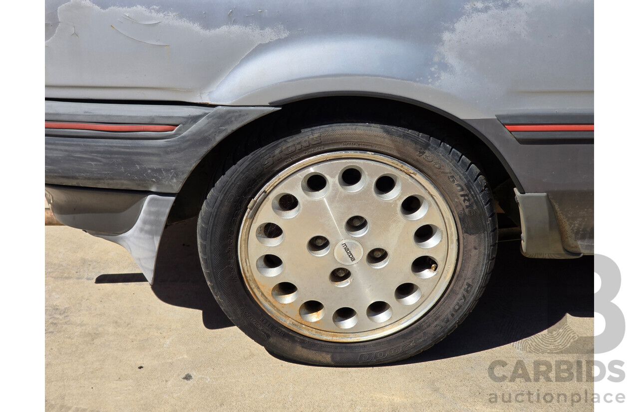 7/1988 Ford Laser TX3 KE 3d Hatchback Grey 1.6L