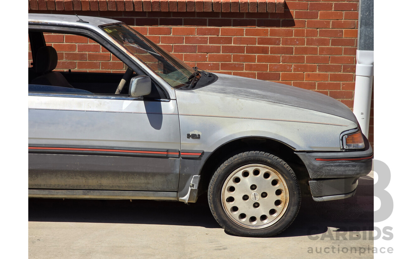 7/1988 Ford Laser TX3 KE 3d Hatchback Grey 1.6L