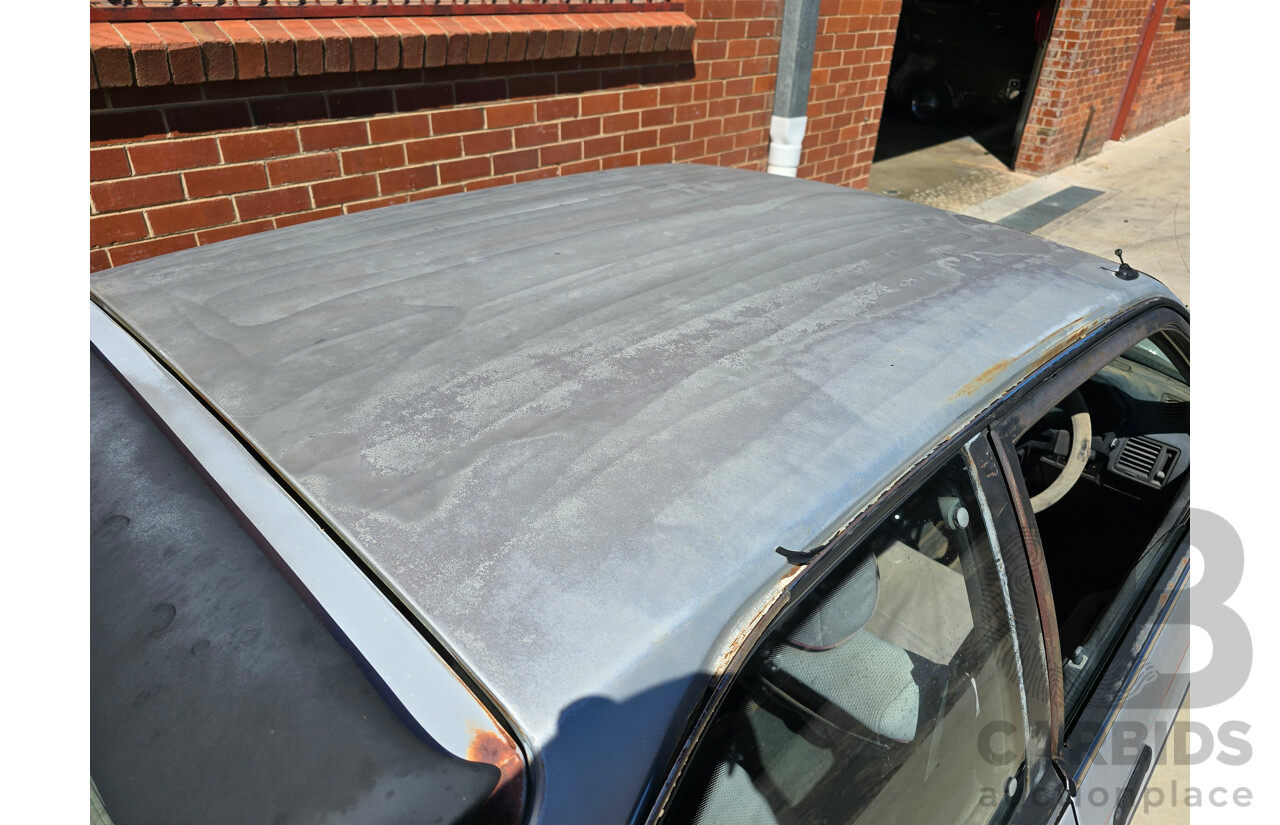 7/1988 Ford Laser TX3 KE 3d Hatchback Grey 1.6L