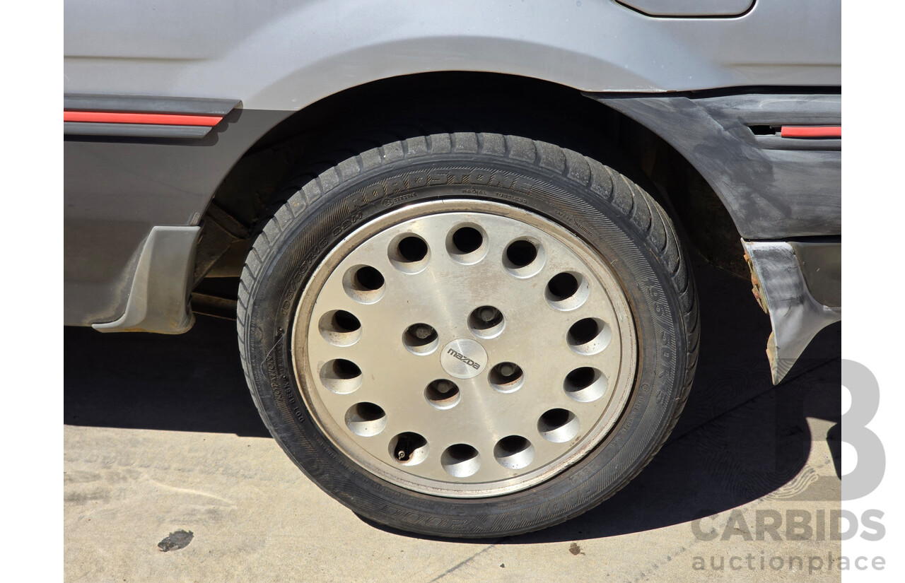 7/1988 Ford Laser TX3 KE 3d Hatchback Grey 1.6L