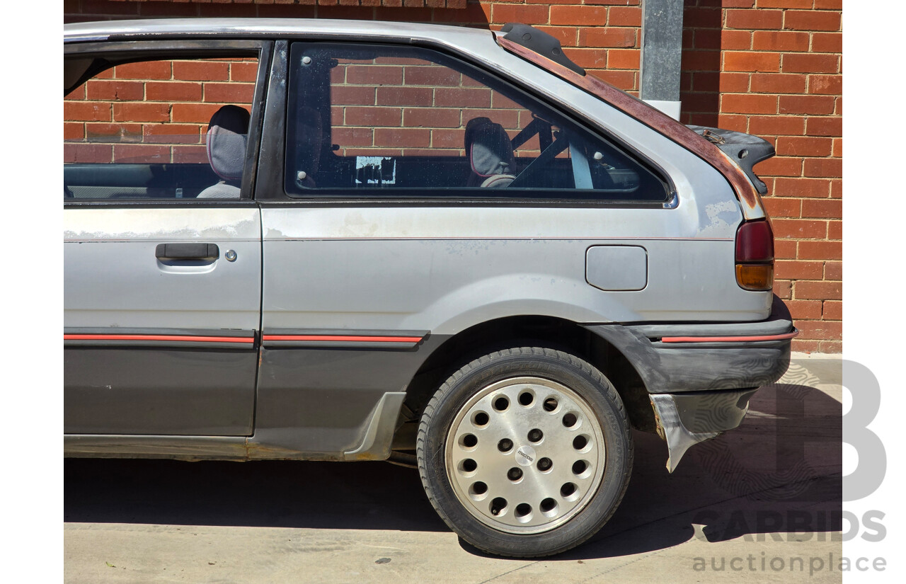 7/1988 Ford Laser TX3 KE 3d Hatchback Grey 1.6L