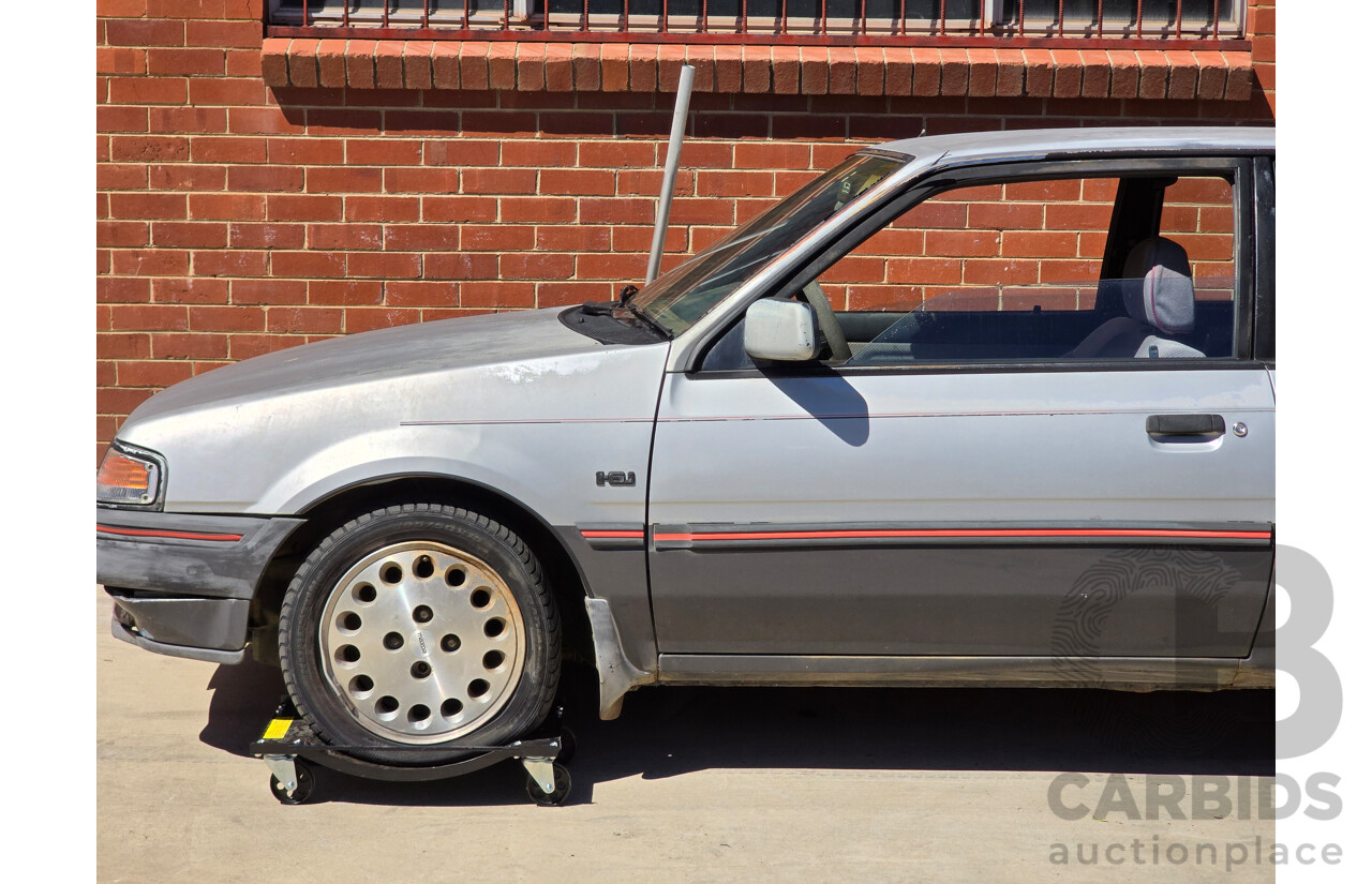 7/1988 Ford Laser TX3 KE 3d Hatchback Grey 1.6L