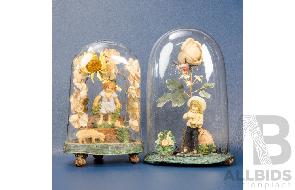 Two Victorian Glass Dome Floral and Wax Carved Figures