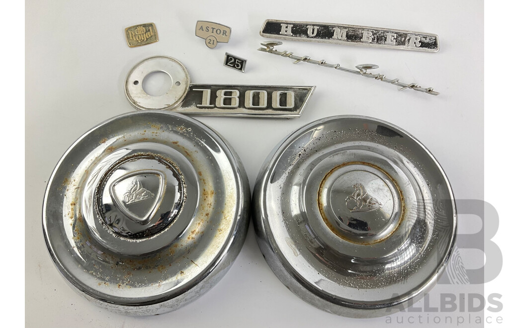 Two Holden FB Hubcaps, Automotive Badges Including Humber Supersnipe and Astor 21