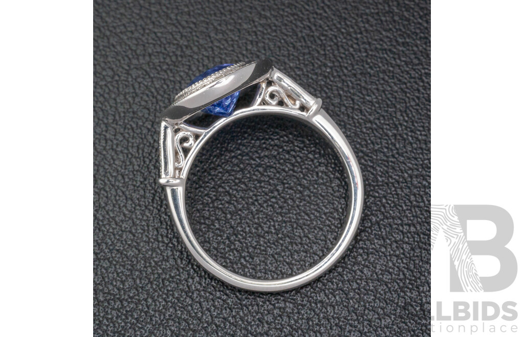 NEW - 14ct White Gold Tanzanite & Diamond Halo Ring, T2.37ct/TDW0.43ct, Size N, 4.66 Grams