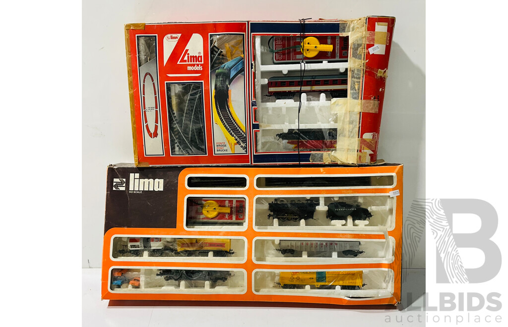 Two Boxed Lima HO Scale Battery Operated Train Sets, Steam Locomotive and French Diesel in Original Packaging