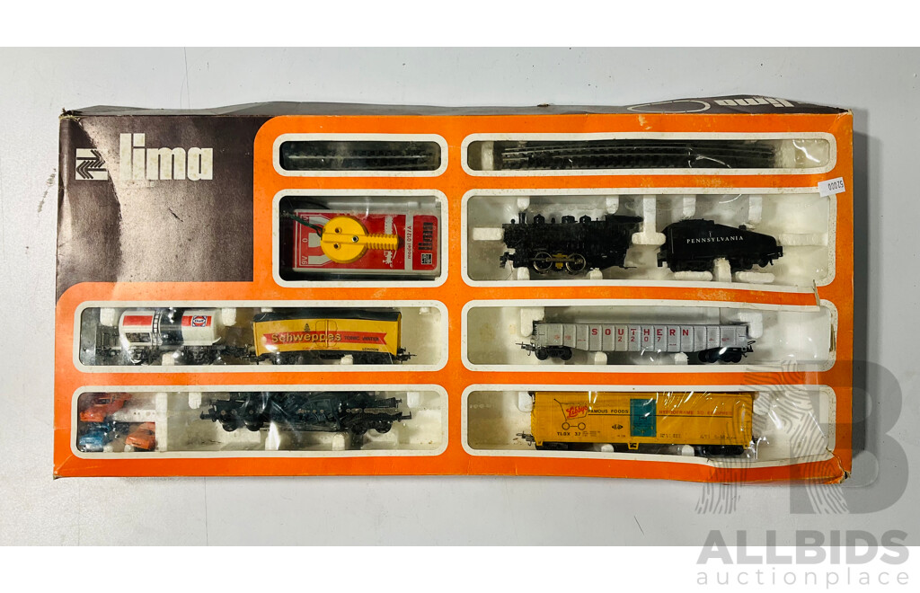 Two Boxed Lima HO Scale Battery Operated Train Sets, Steam Locomotive and French Diesel in Original Packaging