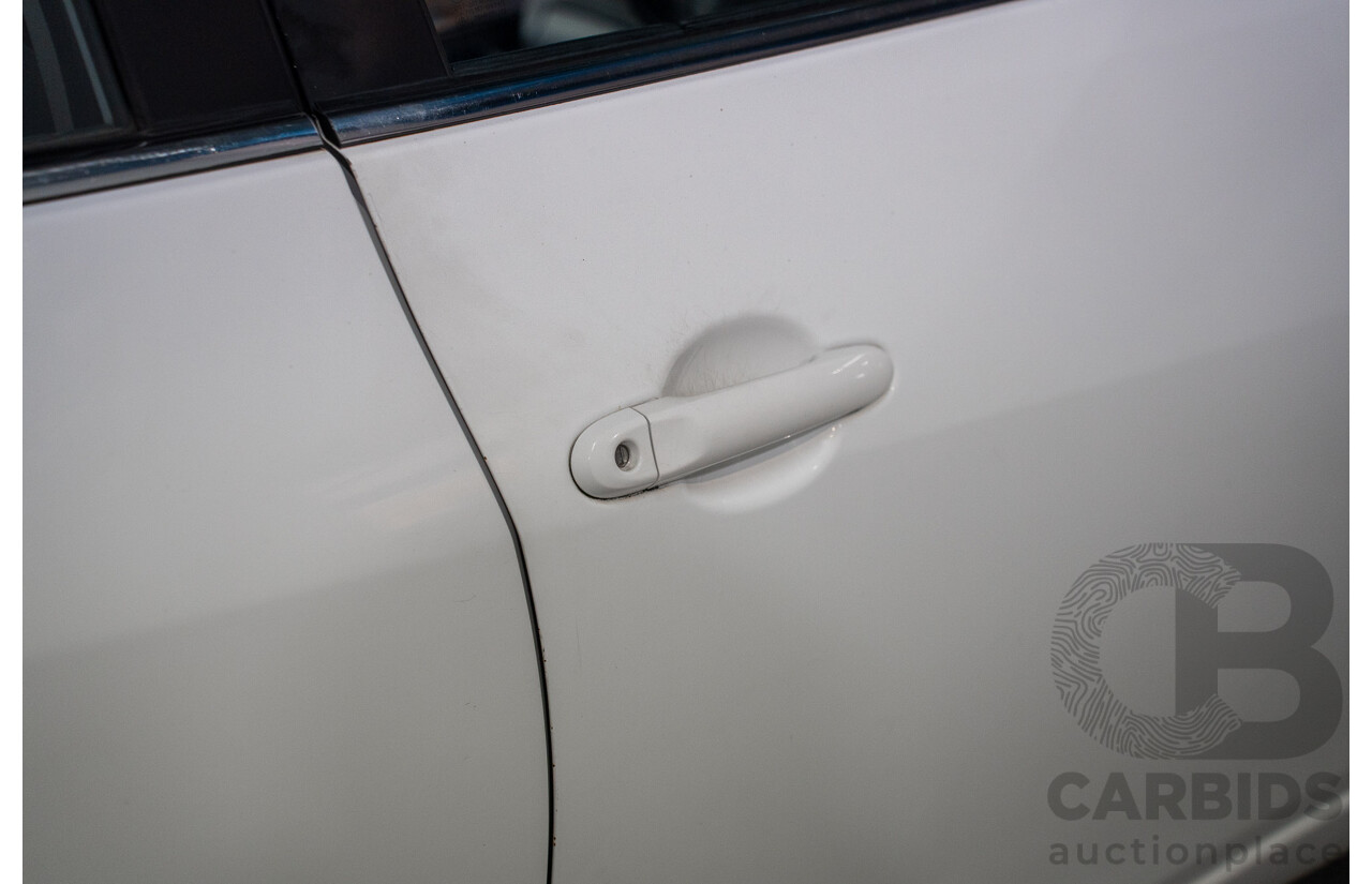 6/2014 Nissan Pulsar ST-L C12 5d Hatchback Polar White 1.8L