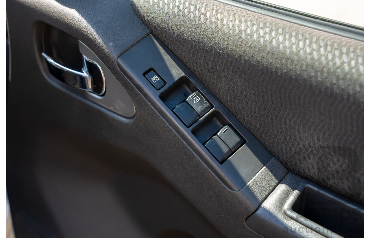 01/2013 Nissan Navara ST (4x2) D40 MY12 Dual Cab P/Up Silver Lightning Metallic Turbo Diesel 2.5L