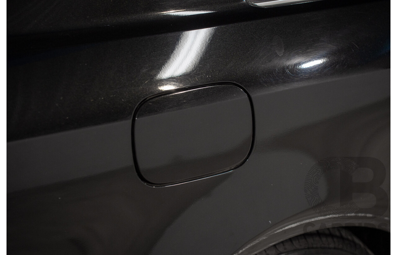 2/2005 Mercedes-Benz CLK200K Elegance C209 2d Coupe Obsidian Black Metallic Supercharged 1.8L