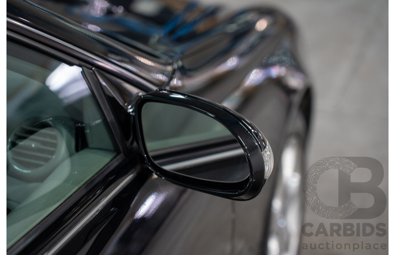 2/2005 Mercedes-Benz CLK200K Elegance C209 2d Coupe Obsidian Black Metallic Supercharged 1.8L