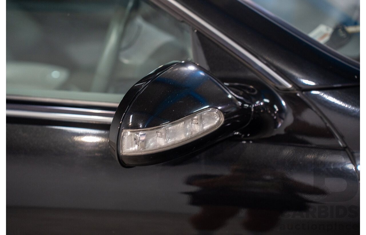 2/2005 Mercedes-Benz CLK200K Elegance C209 2d Coupe Obsidian Black Metallic Supercharged 1.8L