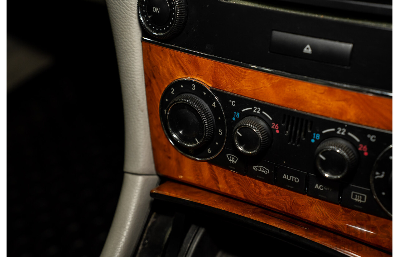 2/2005 Mercedes-Benz CLK200K Elegance C209 2d Coupe Obsidian Black Metallic Supercharged 1.8L