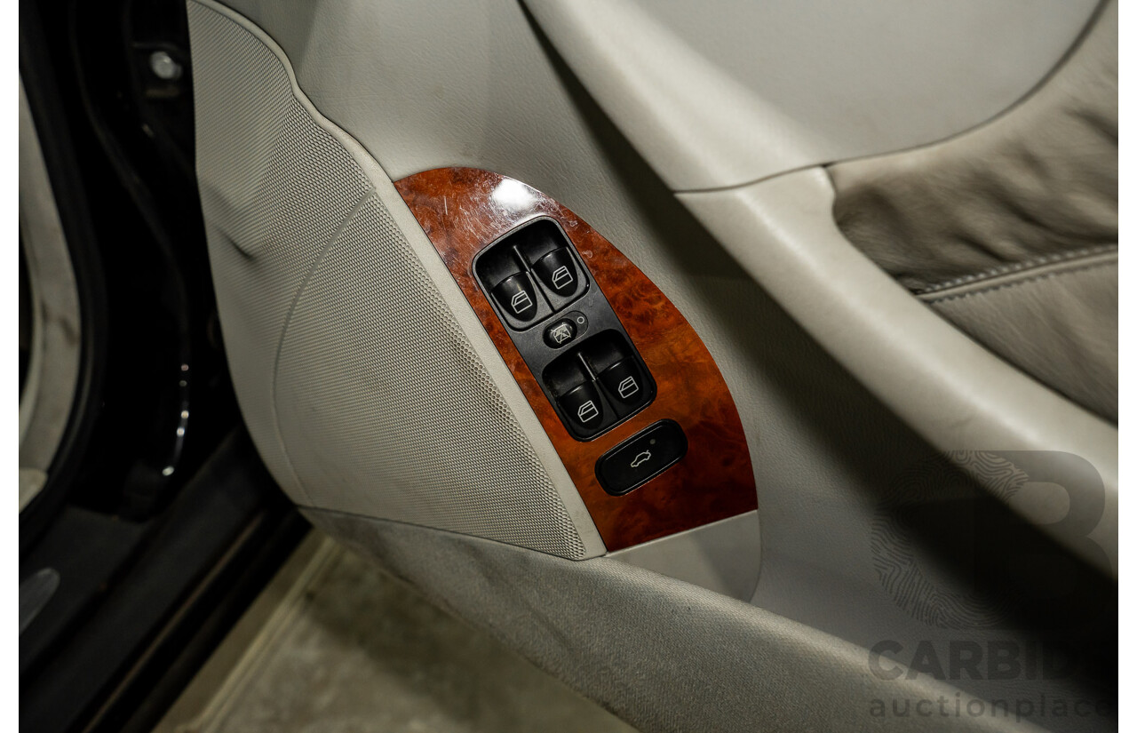 2/2005 Mercedes-Benz CLK200K Elegance C209 2d Coupe Obsidian Black Metallic Supercharged 1.8L