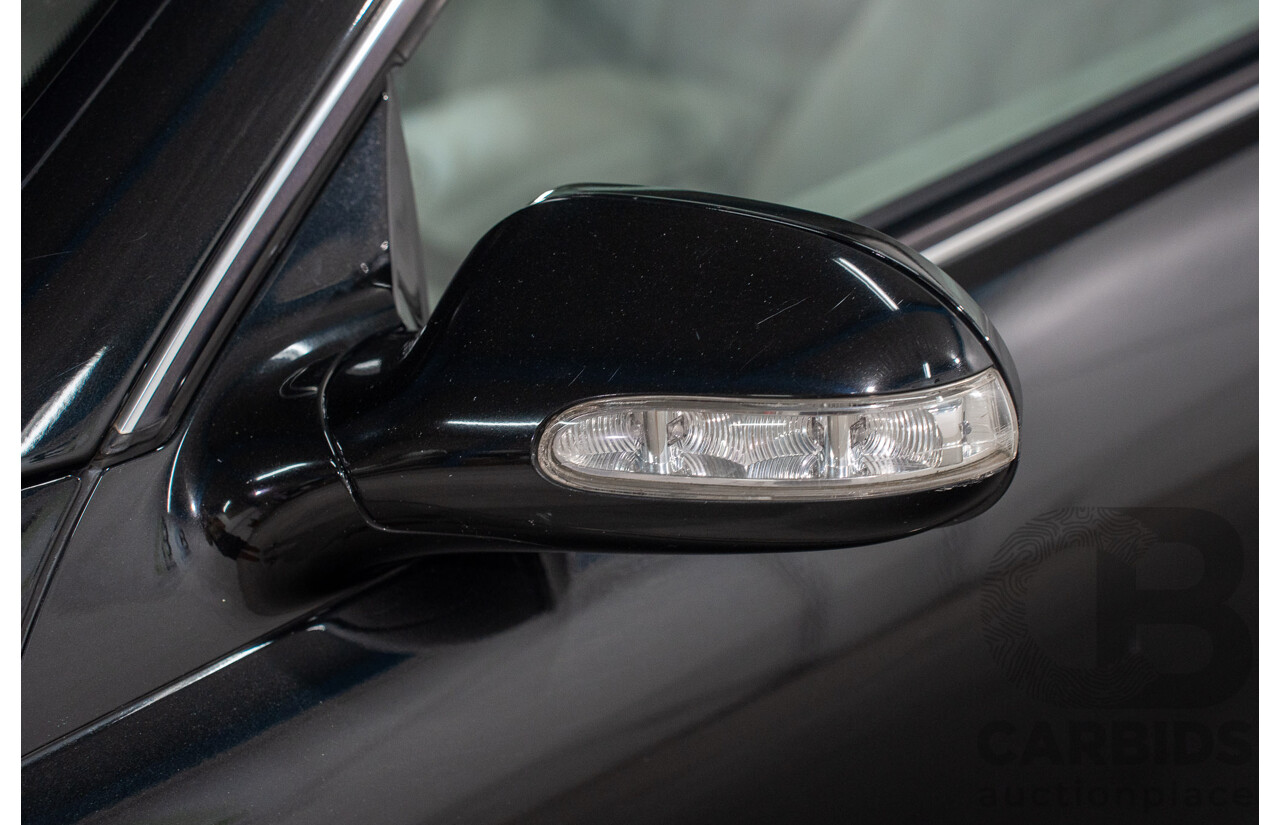 2/2005 Mercedes-Benz CLK200K Elegance C209 2d Coupe Obsidian Black Metallic Supercharged 1.8L