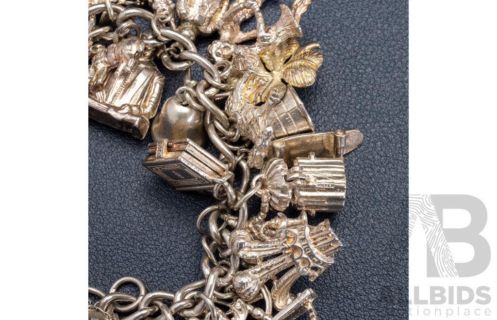 Sterling Silver Vintage Heart Padlock Bracelet with (39) Vintage Sterling Silver Charms, 101.0 Grams