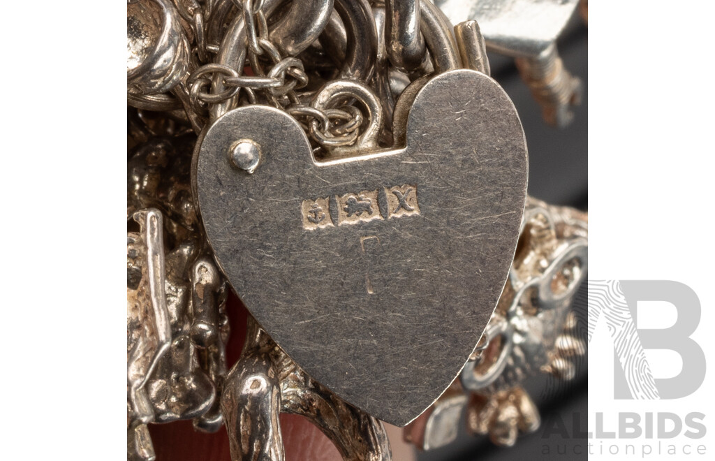 Sterling Silver Vintage Heart Padlock Bracelet with (39) Vintage Sterling Silver Charms, 101.0 Grams