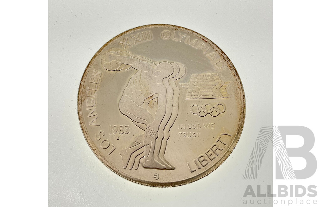 USA 1983 Silver One Dollar Coin, 1984 Olympic Games in Los Angeles - Disc Thrower  .900