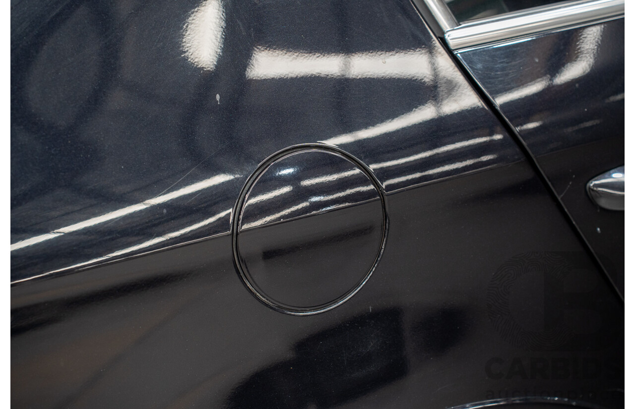 10/2009 Volkswagen Passat R36 (AWD) 3C MY09 UPGRADE 4d Sedan Deep Black Turbo 3.6L