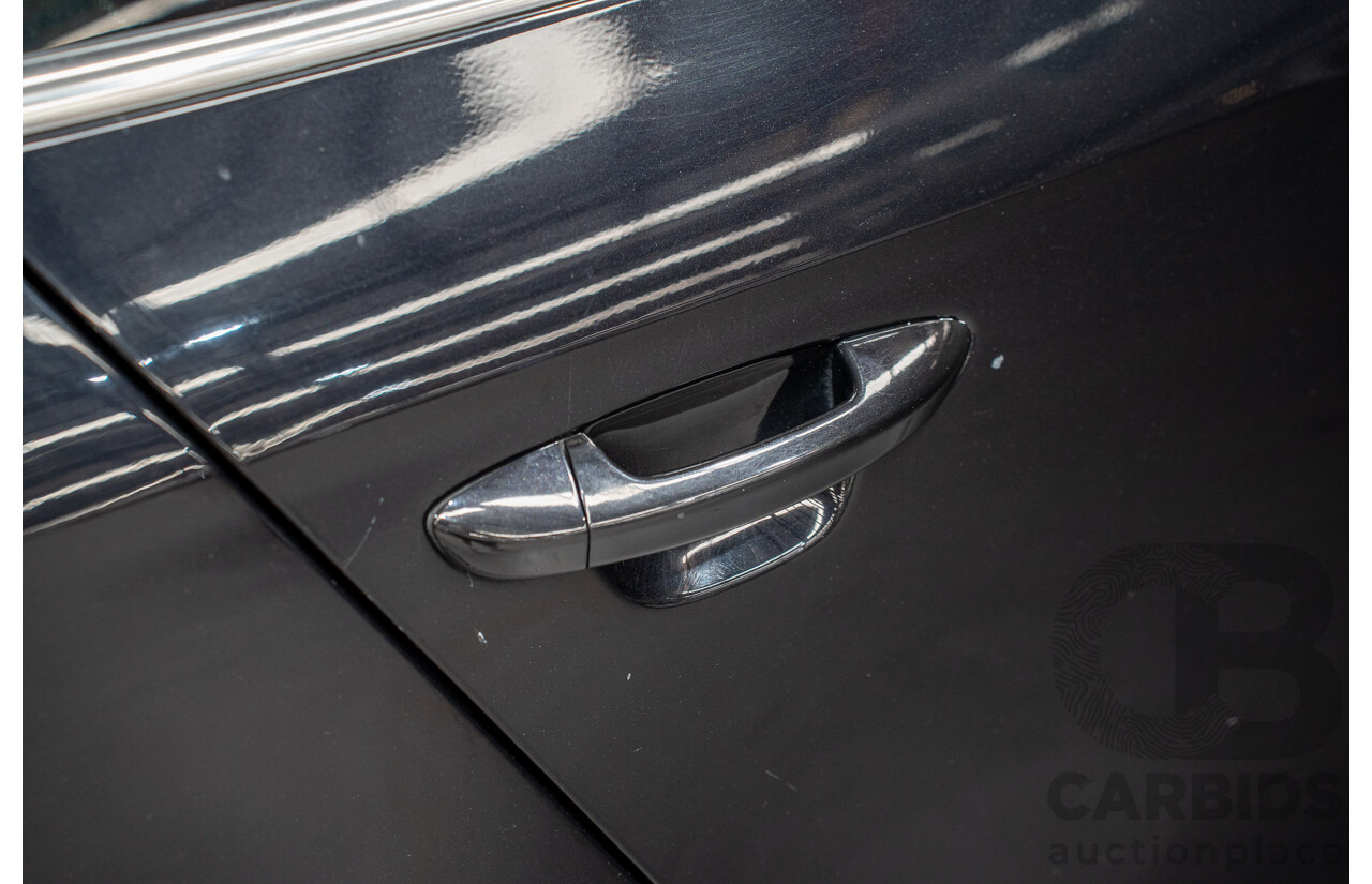 10/2009 Volkswagen Passat R36 (AWD) 3C MY09 UPGRADE 4d Sedan Deep Black Turbo 3.6L