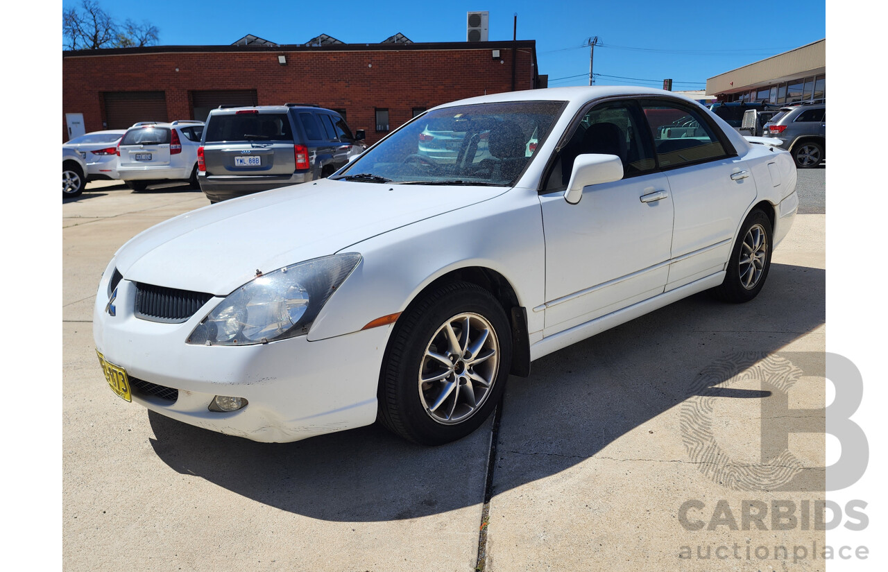 9/2003 Mitsubishi Magna Sports AWD TJ 4d Sedan White 3.5L