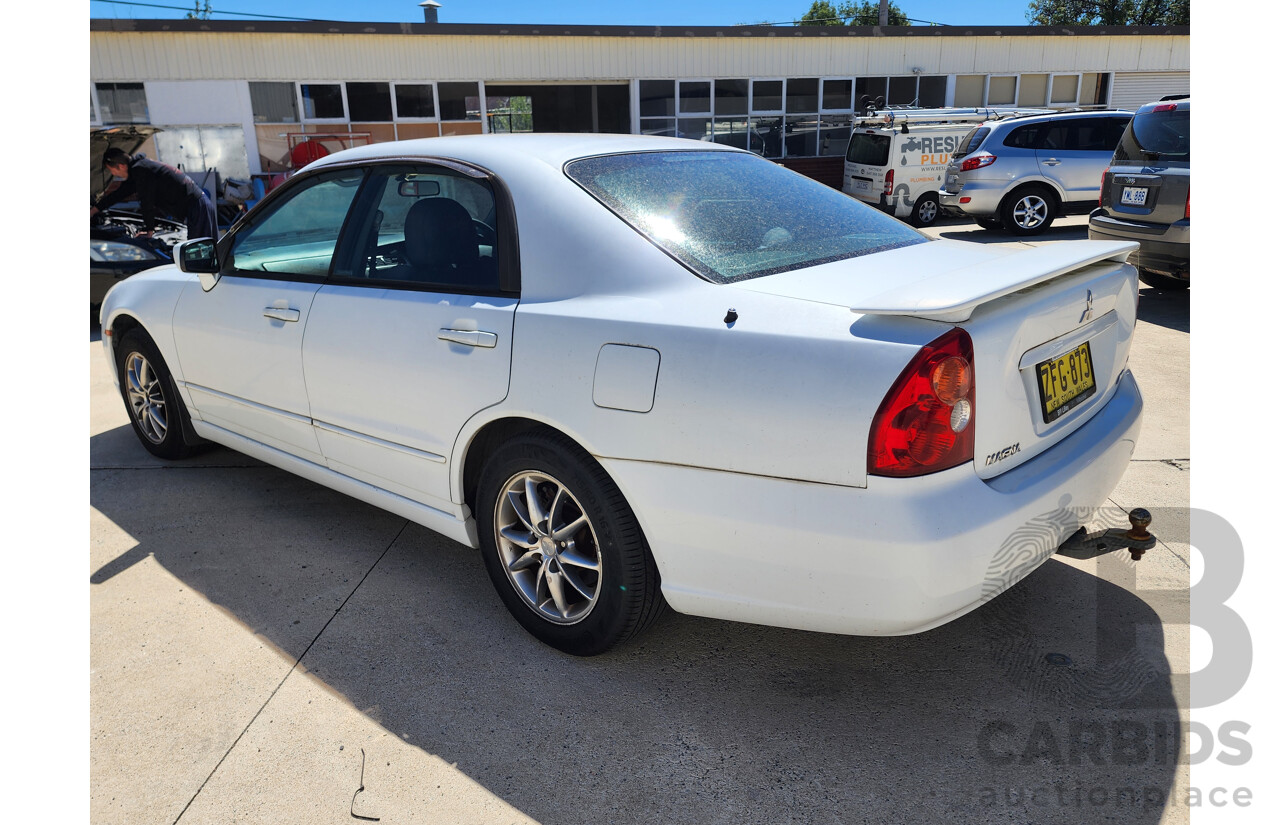 9/2003 Mitsubishi Magna Sports AWD TJ 4d Sedan White 3.5L