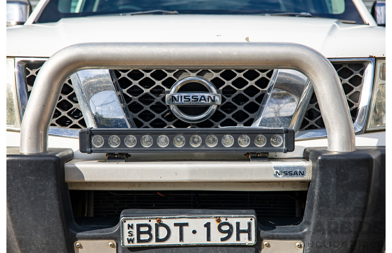 3/2008 Nissan Navara ST-X (4x4) D40 Dual Cab P/Up Arctic White Turbo Diesel 2.5L