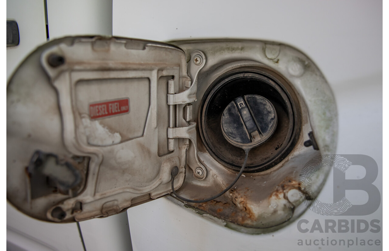 3/2008 Nissan Navara ST-X (4x4) D40 Dual Cab P/Up Arctic White Turbo Diesel 2.5L