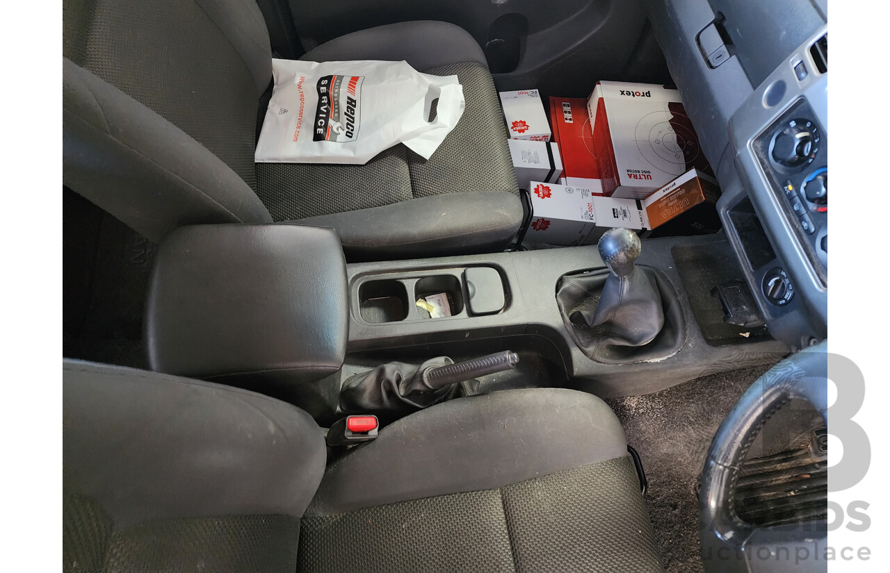 6/2010 Nissan Navara ST (4x4) D40 Dual Cab P/Up White 2.5L