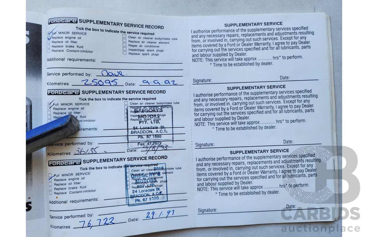 2/1991 Ford Laser GL KF 4d Sedan White 1.6L