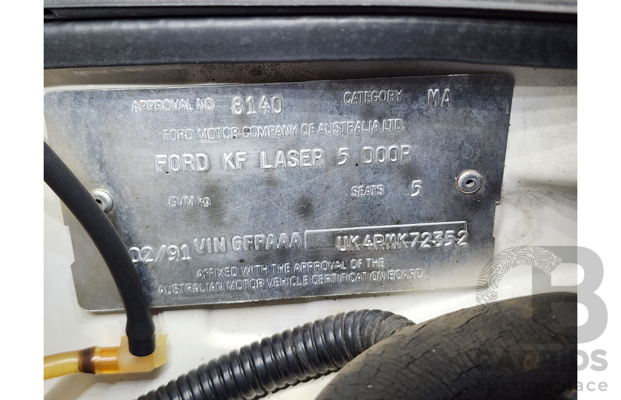 2/1991 Ford Laser GL KF 4d Sedan White 1.6L