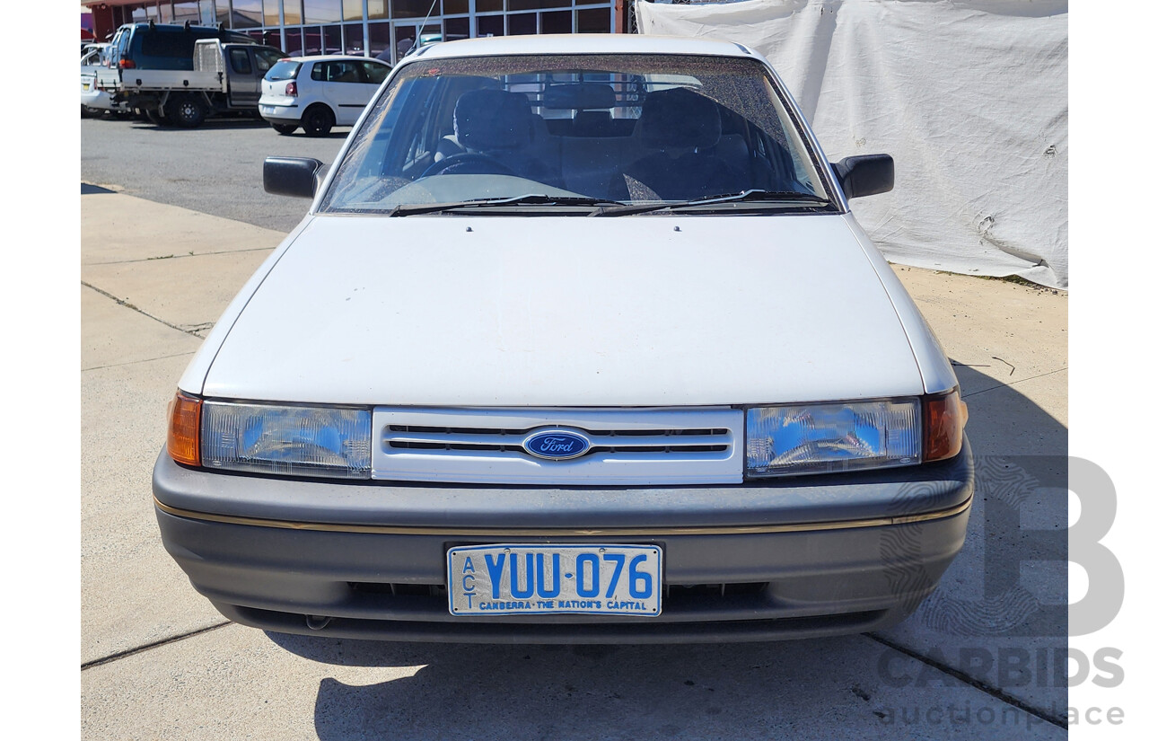 2/1991 Ford Laser GL KF 4d Sedan White 1.6L