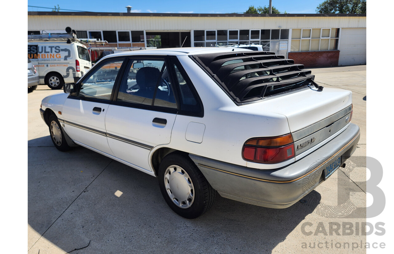 2/1991 Ford Laser GL KF 4d Sedan White 1.6L