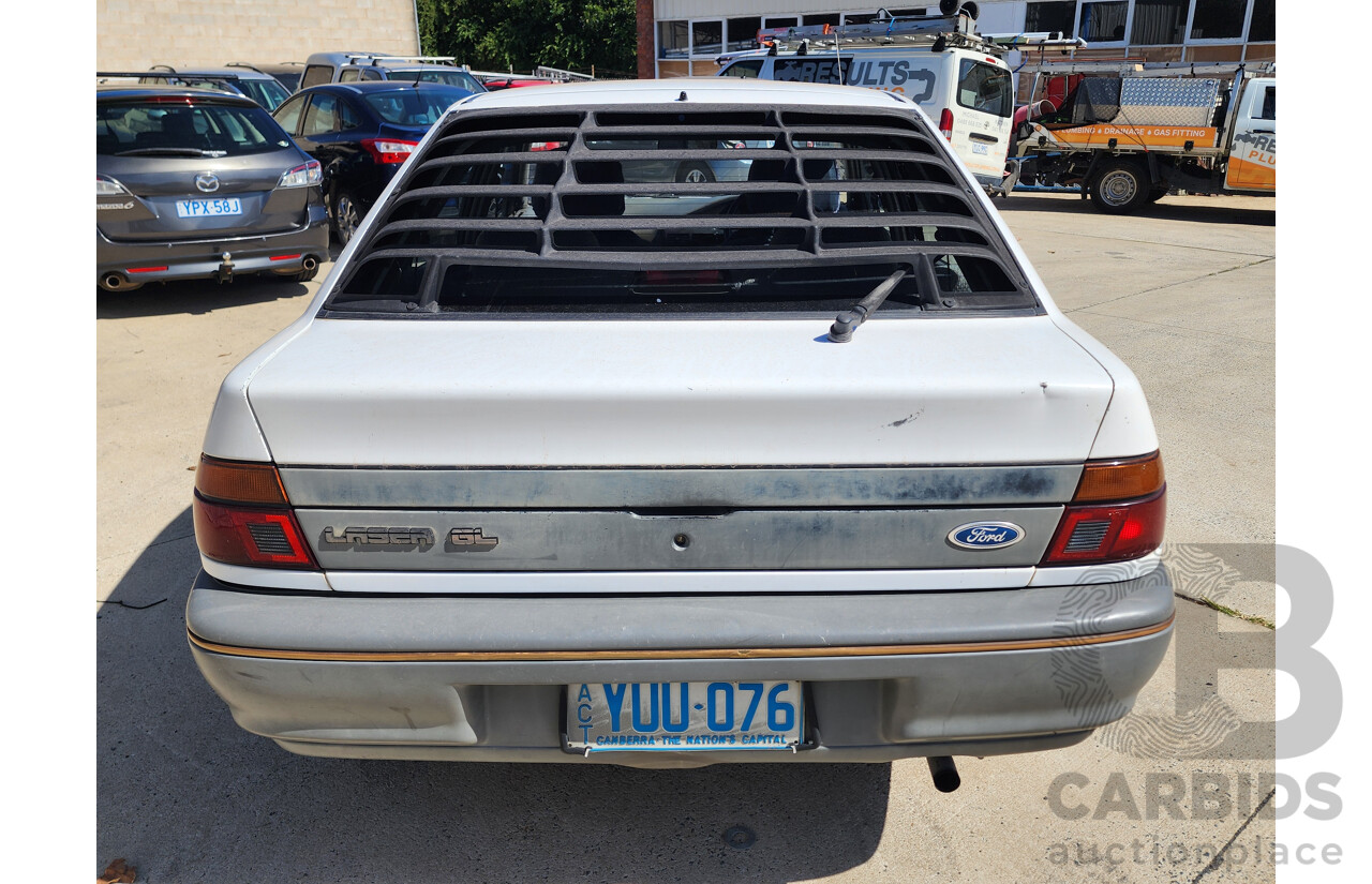 2/1991 Ford Laser GL KF 4d Sedan White 1.6L