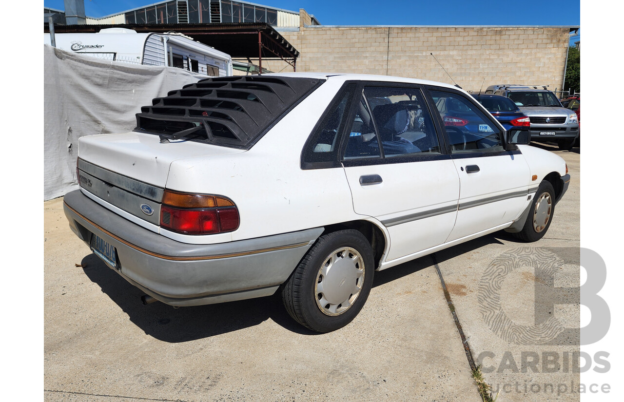 2/1991 Ford Laser GL KF 4d Sedan White 1.6L